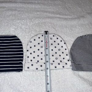 Striped Blue and White Beanie, and one with starts